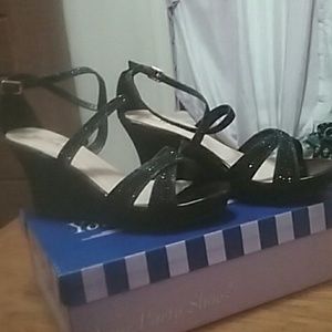 Sparkly black wedges.